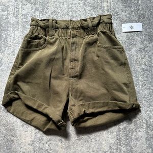 Frame paper bag waisted denim shorts in a neutral green color. Elastic waist